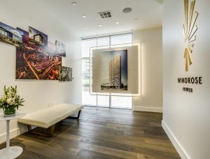 Interior of Windrose Tower displaying photos of Legacy West