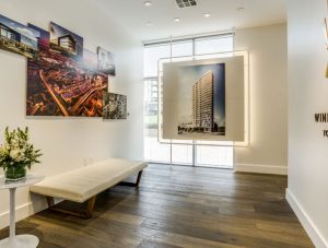 Elegant stone lobby with wood accents. Experience Windrose Tower's unique luxury offerings.